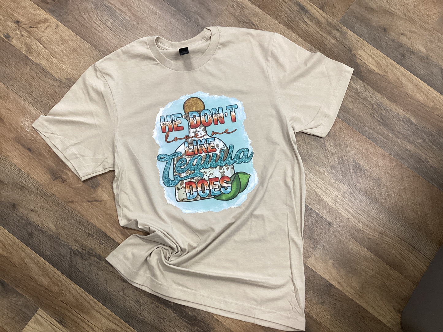 He don’t love me like tequila does Tee