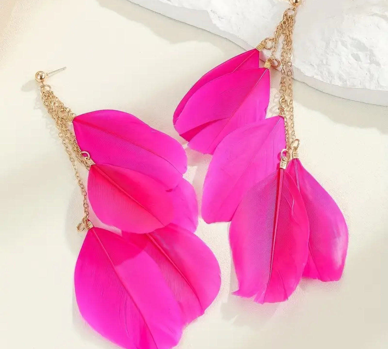 Hot pink feathered earrings